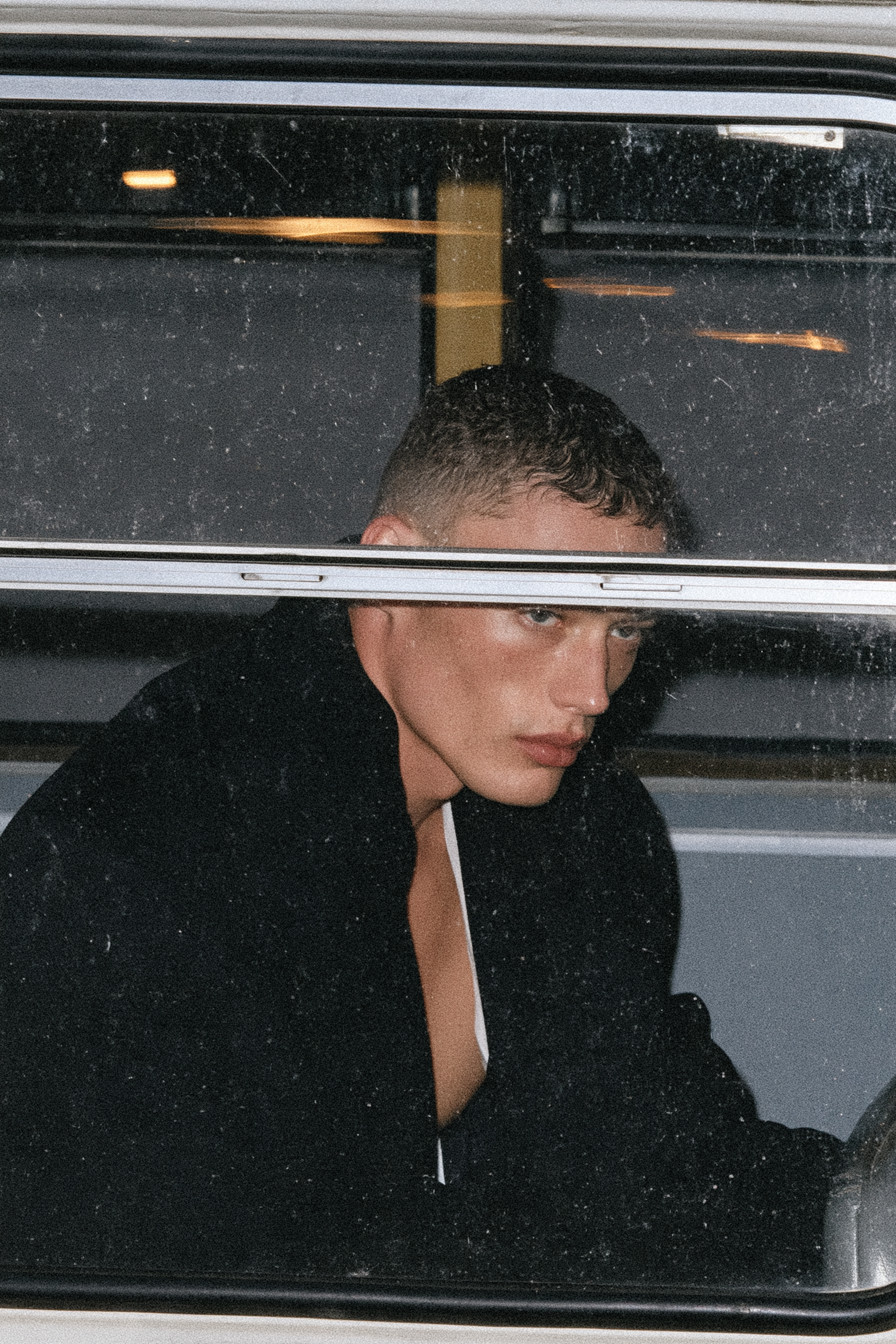 Melancholy Man in a Winter Tram