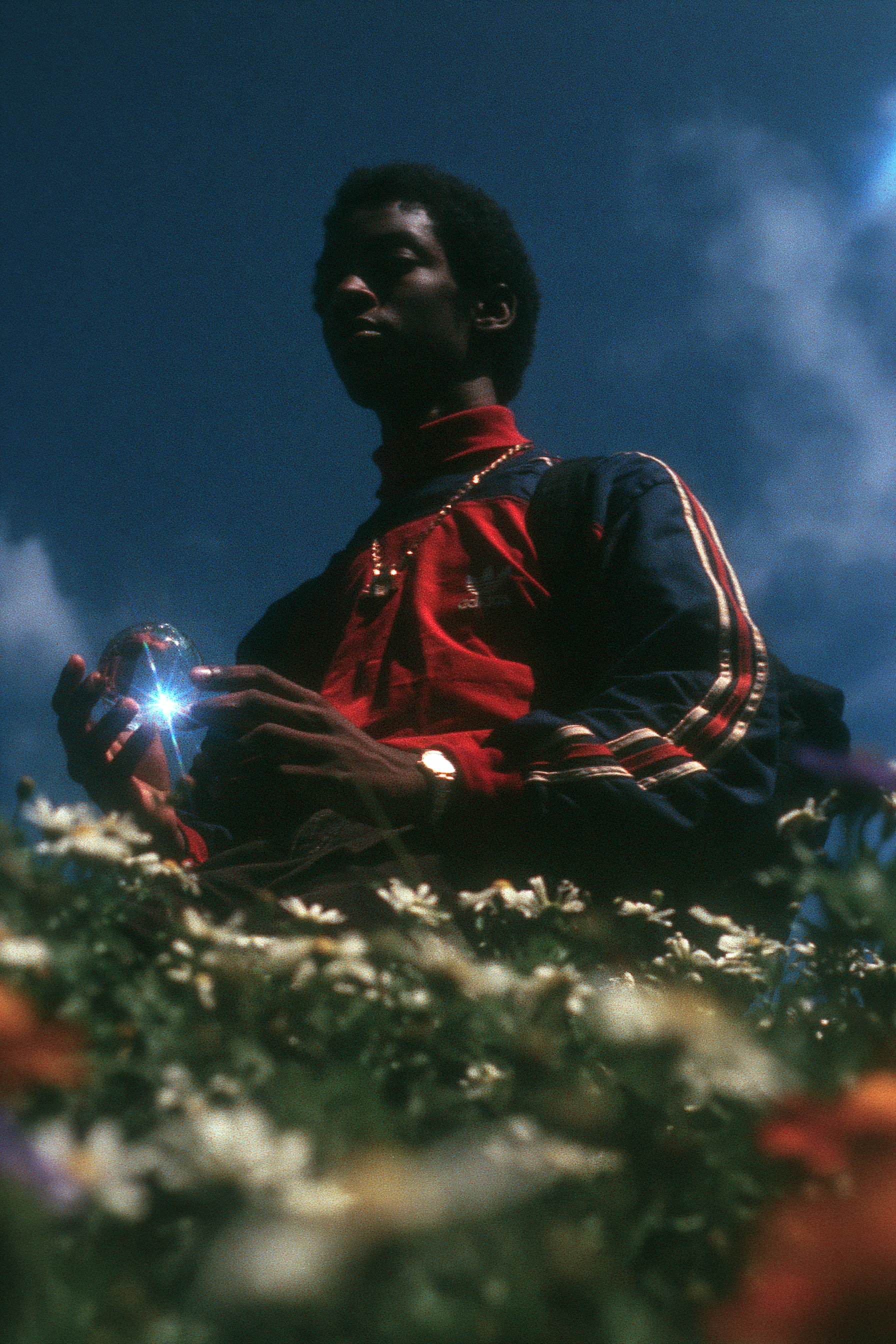 Floating Boy with a Crystal Ball