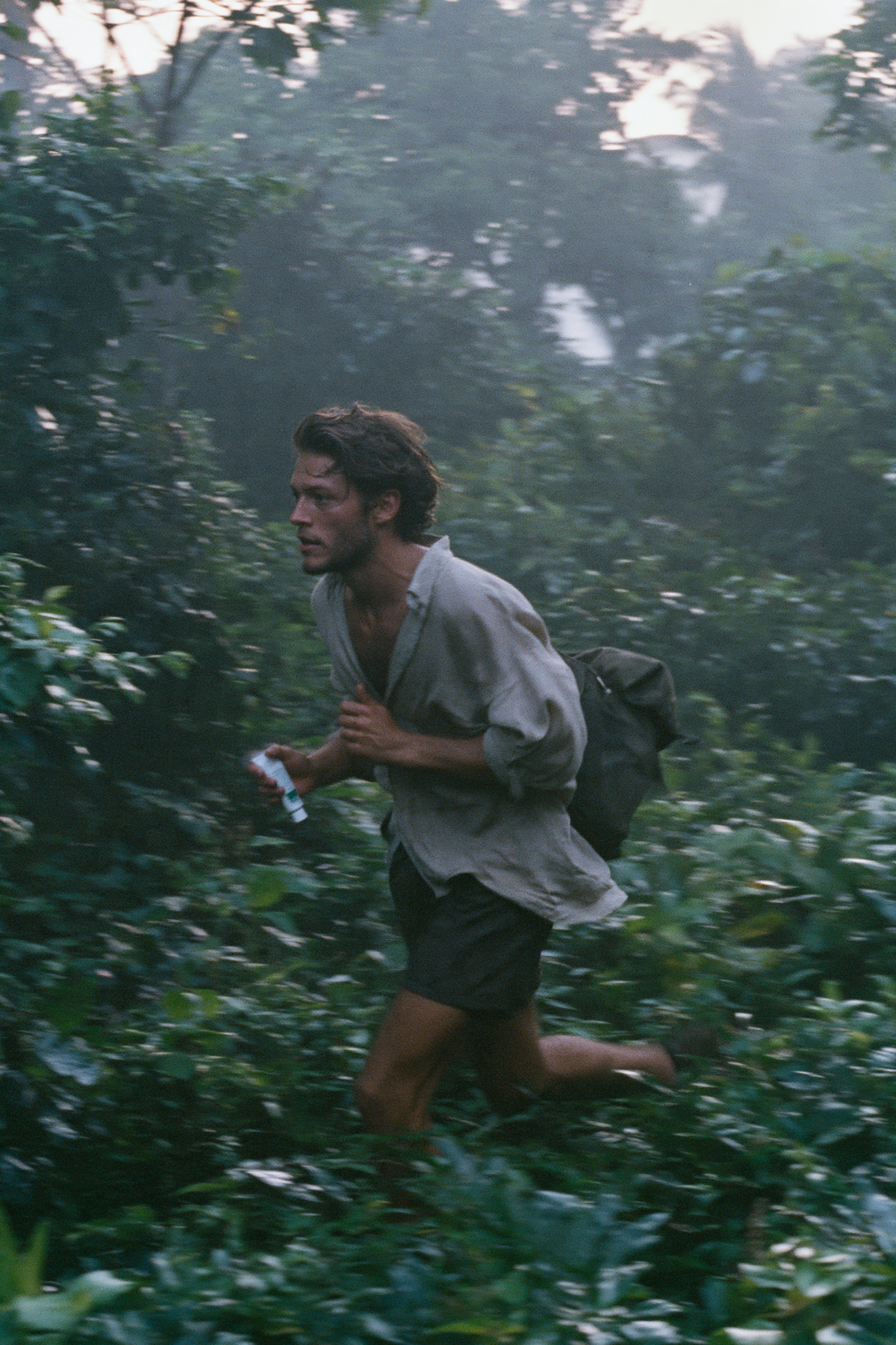 Tired Runner in Grainy Jungle Documentary